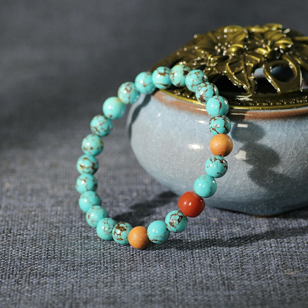 Serene Skies & Earth’s Embrace: Turquoise, Sandalwood, and Red Agate Spirit Bracelet