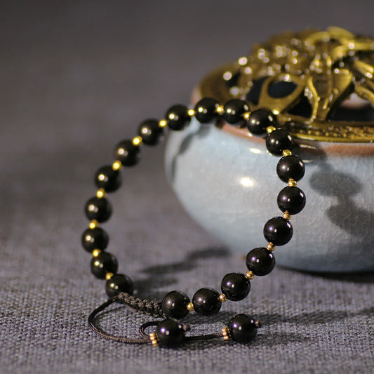 Obsidian Bracelet with Gold Accent Beads – Stylish Contrast