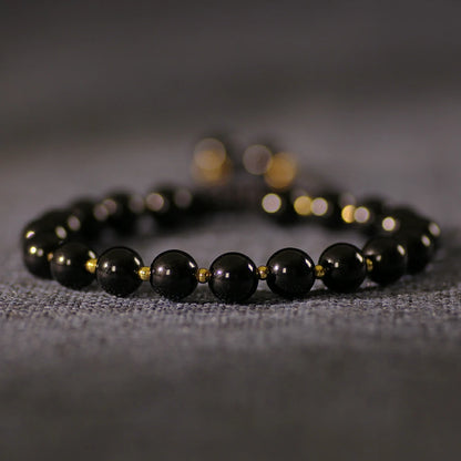 Obsidian Bracelet with Gold Accent Beads – Stylish Contrast