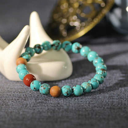 Serene Skies & Earth’s Embrace: Turquoise, Sandalwood, and Red Agate Spirit Bracelet