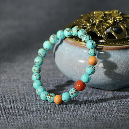 Serene Skies & Earth’s Embrace: Turquoise, Sandalwood, and Red Agate Spirit Bracelet