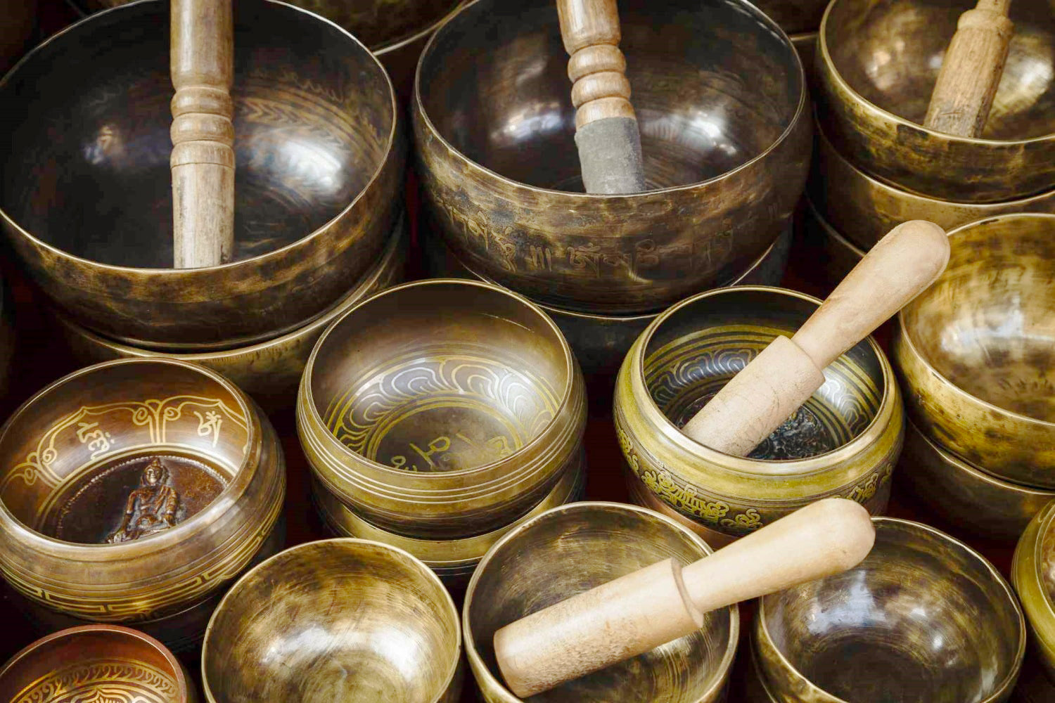 Various old Nepalese copper singing bowls of various sizes